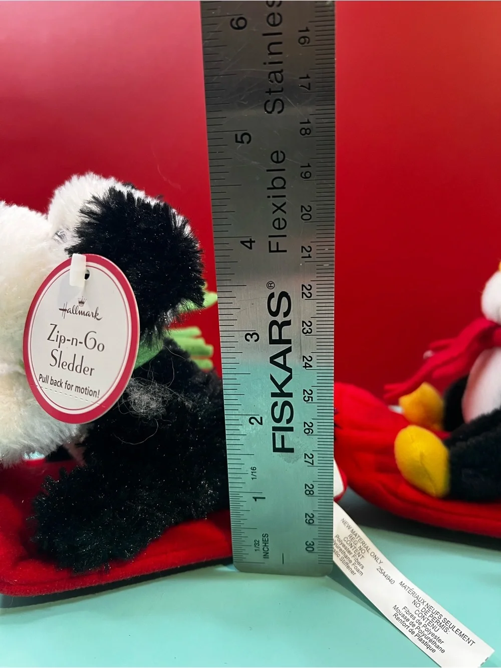 Hallmark Black & White Penguin with Red Scarf Plush Sledder